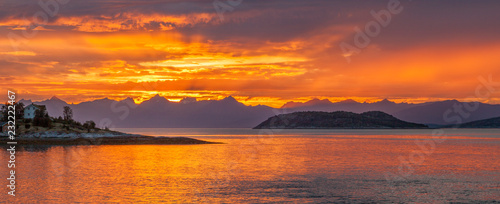 The midnight sun in the Lofoten Islands Norway photo