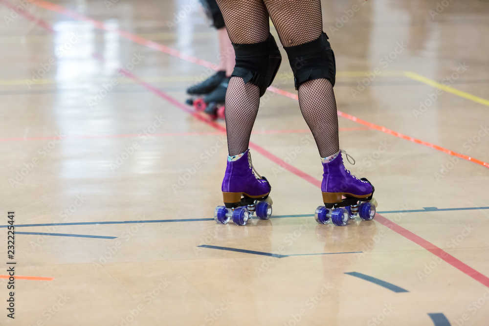 Roller derby players compete against each other