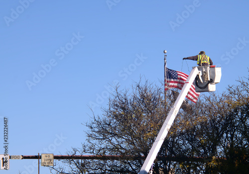 Hanging Christmas Lights Any Town USA photo