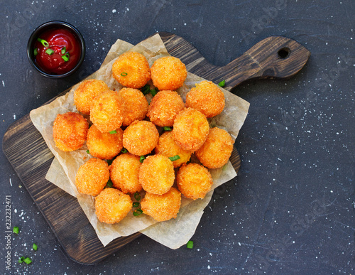 cheese balls with tomato sauce. photo