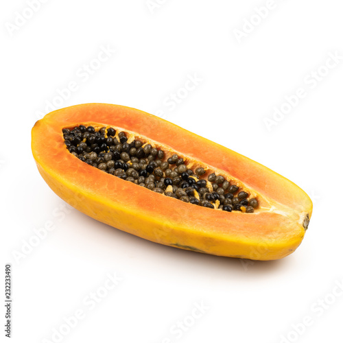 Ripe fresh sweet papaya and half cut with seed (Carica papaya L.) isolated on white background.Healthy fruits to the digestive system.