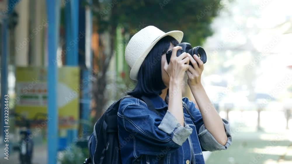 Attractive female photographer taking photo while travel. People with travel, lifestyle, holiday concept. Attractive female photographer taking photo while travel. People with travel, lifestyle, holiday concept.