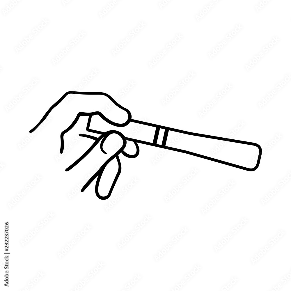 Hand holding positive pregnancy test result Hand holding positive pregnancy test result