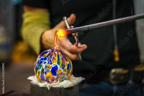 A Glass Blower Making a Beautiful Glass Orb