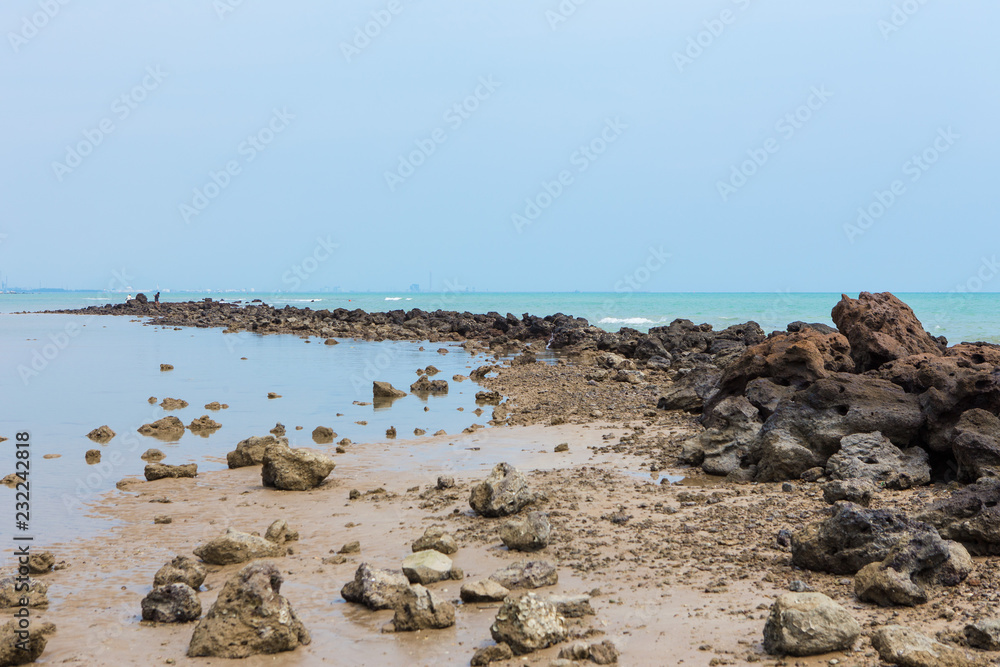 Rocks on the beach and turquoise sea Rocks on the beach and turquoise sea