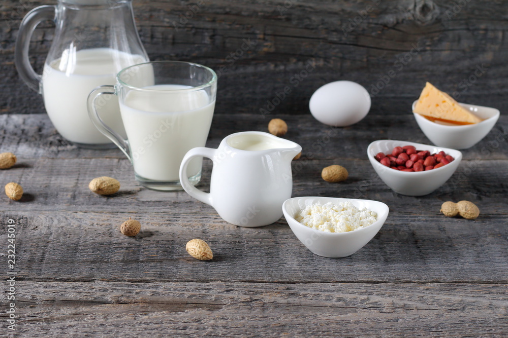 Breakfast on the table. Composition of dairy products on a wooden background. Breakfast on the table. Composition of dairy products on a wooden background.