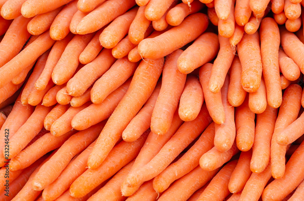 Beautiful ripe carrot background. Carrots are good for health. Beautiful ripe carrot background. Carrots are good for health.