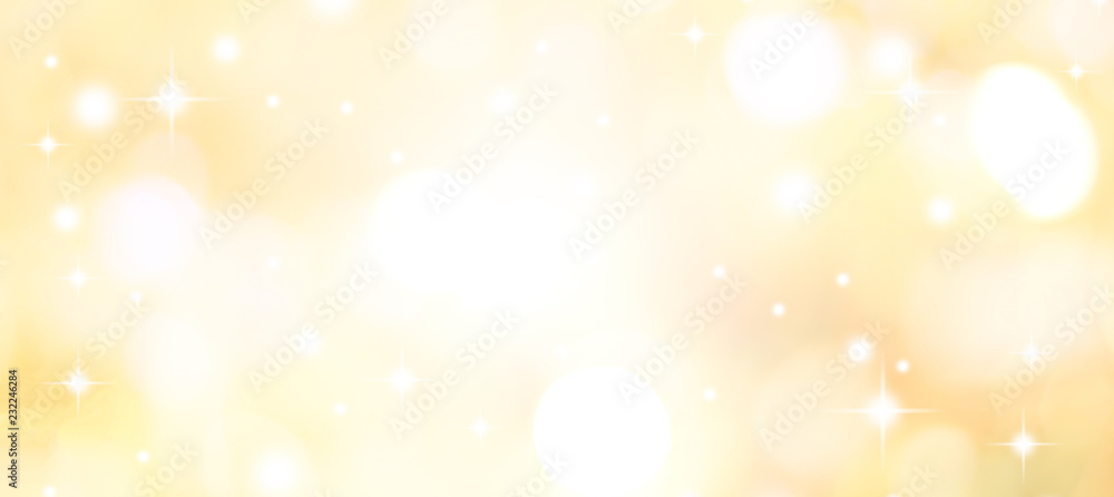 abstract blur glowing gold yellow color background with bokeh ,snow and shine star for merry christmas and happy new year