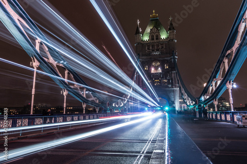 Canvas Print An Iconic Photo Of Tower Bridge In London, The Light Trails Of A Bus Fill The Im