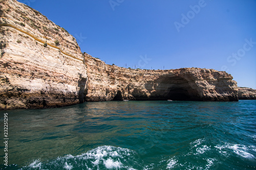 Rocks, cliffs and ocean landscape at coast in AAlgarve, Portugal view from boat