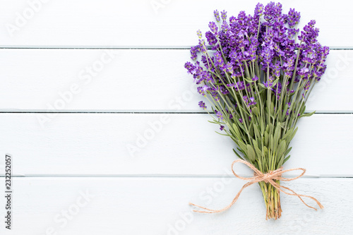 Fototapeta Naklejka Na Ścianę i Meble -  Lavender flowers, bouquet on rustic background, overhead.