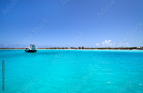 Ferry boat  brings back the people from Half Moon Cay island to their cruise ship after a day ashore. © Studio F.