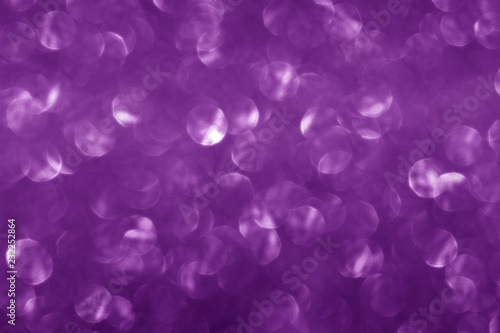 Purple glitter sparkling background. Shiny glam abstract texture. 