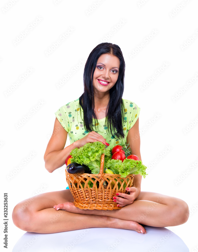 Portrait of slim fitness cherrful girl in studio with set of fruit and vegetables over white background. Healthy eating, diet, fitness, weight lose, fitness diet, workout programs for women concept. Portrait of slim fitness cherrful girl in studio with set of fruit and vegetables over white background. Healthy eating, diet, fitness, weight lose, fitness diet, workout programs for women concept.
