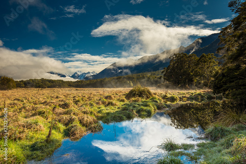 Mirror Lakes with reflection of Earl Mountains, Fjordland National Park, Millford, New Zealand