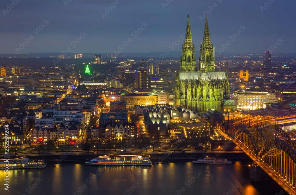 View of Cologne and the Cologne cathedral in the night from height of bird's flight