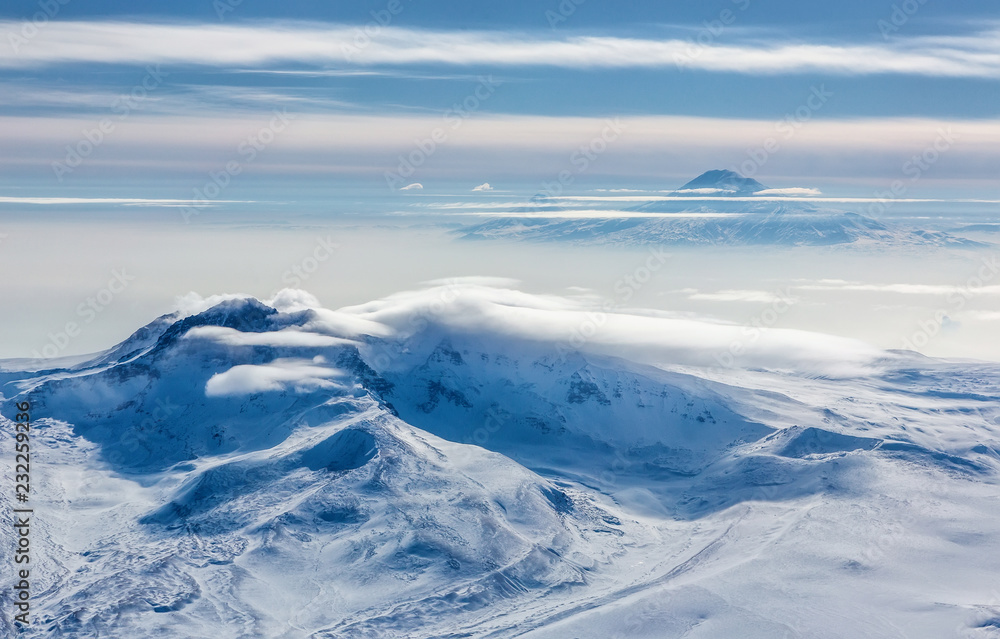 Snow-covered mountains of the Caucasus Mountains and Elbrus, the view from the heights