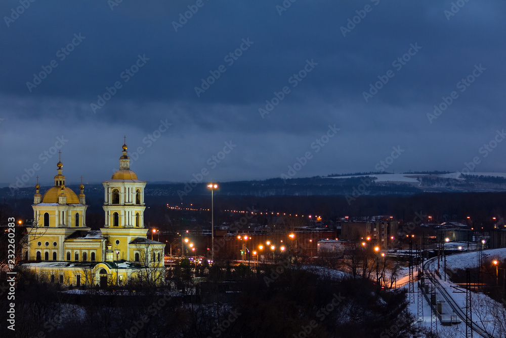 Spaso-Preobrazhensky Cathedral in the early morning, illuminated by the warm light from the street lamps.
