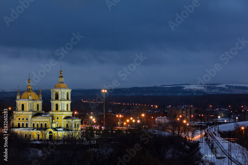 Spaso-Preobrazhensky Cathedral in the early morning, illuminated by the warm light from the street lamps.