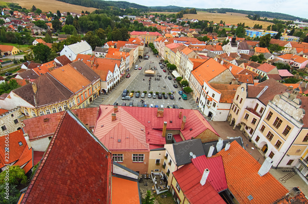 Fototapeta premium Picturesque view of Peace Town Square from bell tower in Slavonice. Beautiful houses with vintage tile roofs. Slavonice, Czech Republic