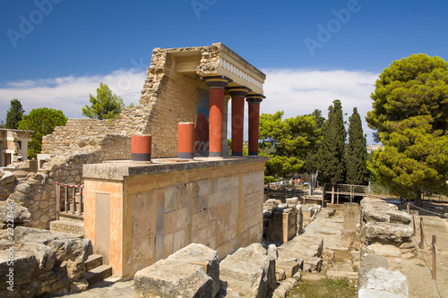 Red columns of the Knossos palace. Knossos palace on the island of Crete in Greece. Ancient ruins of the burning part of the Archaeological Museum in Heraklion.