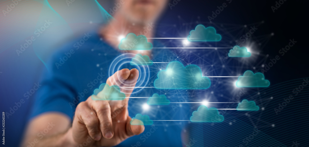 Fototapeta premium Man touching a cloud networking concept