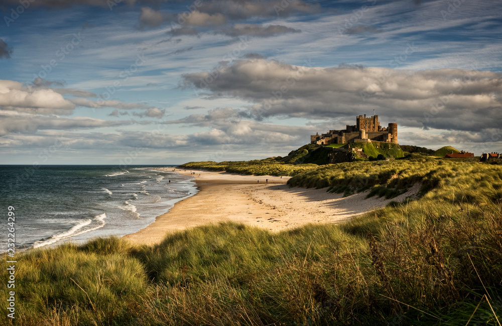 Late afternoon light on the castle and beach at Bamburgh