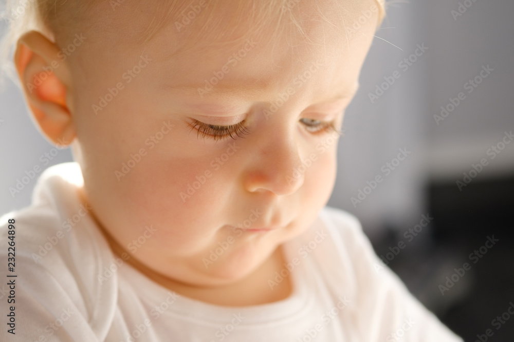 Portrait of a baby at home. Emotions of a child Portrait of a baby at home. Emotions of a child