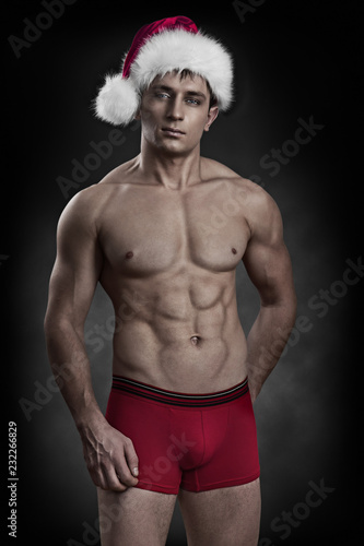 handsome naked guy weared christmas clothes