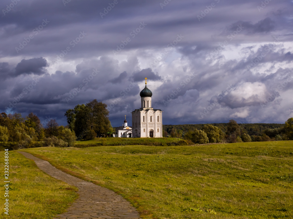  Autumn rural russian landscape with church.  Church of the Intercession of the Blessed Virgin (Pokrova-na-Nerli). 