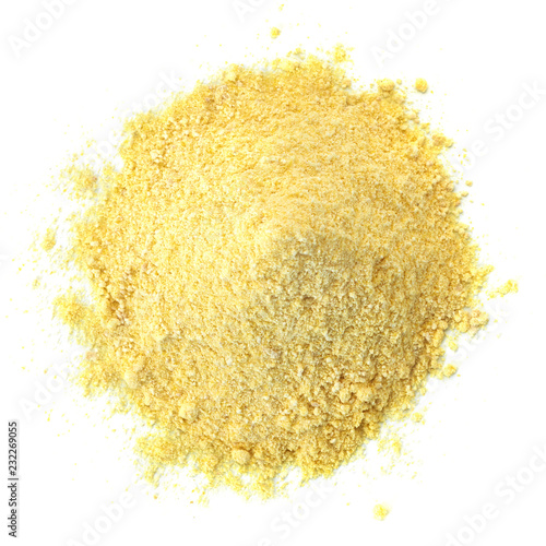 Corn meal pile from top view isolated on white background photo