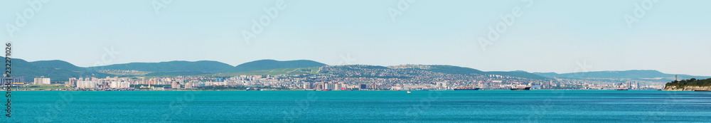 Panoramic view on the city of Novorossiysk, Novorossiysk Bay of Black sea. Russian port town, Krasnodar region. Tourism, travel, summertime
