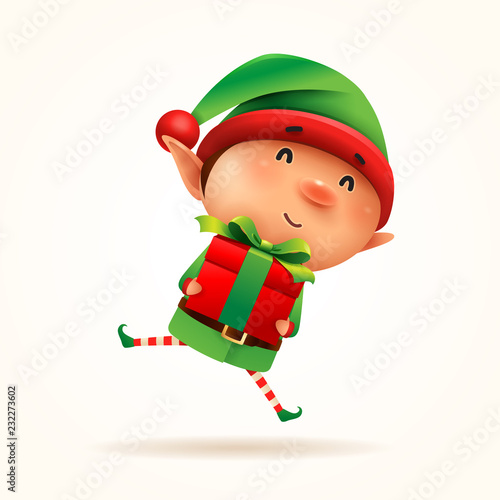 Little elf with gift present. Isolated. photo