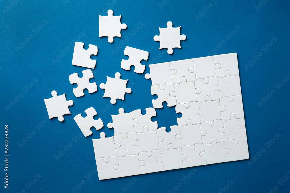 Jigsaw puzzle on color background Jigsaw puzzle on color background