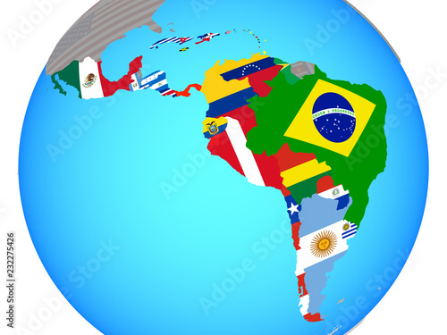 Fototapeta Latin America with national flags on blue political globe.