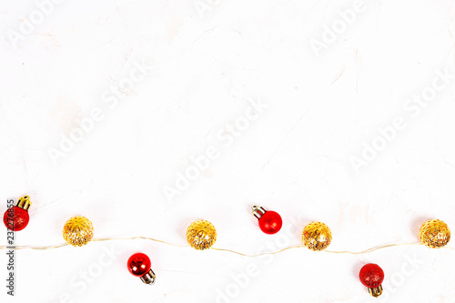 Christmas mood concept. Layout composition with traditional festive attributes, green decorative fresh pine tree branches. Winter holidays season. Background, copy space, close up, top view, flat lay.