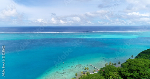 Fototapeta Naklejka Na Ścianę i Meble -  bungalow on the water in aerial view, french polynesia