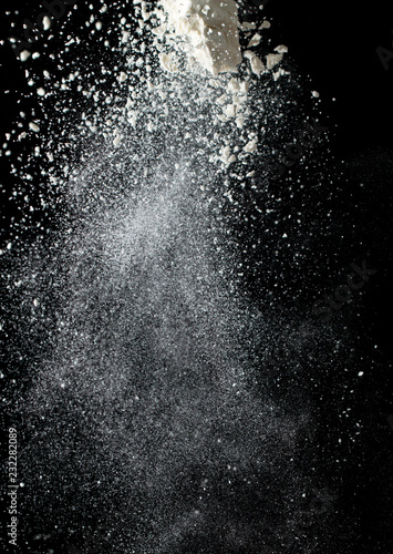 white flour on a black background