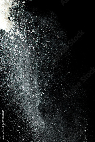 white flour on a black background