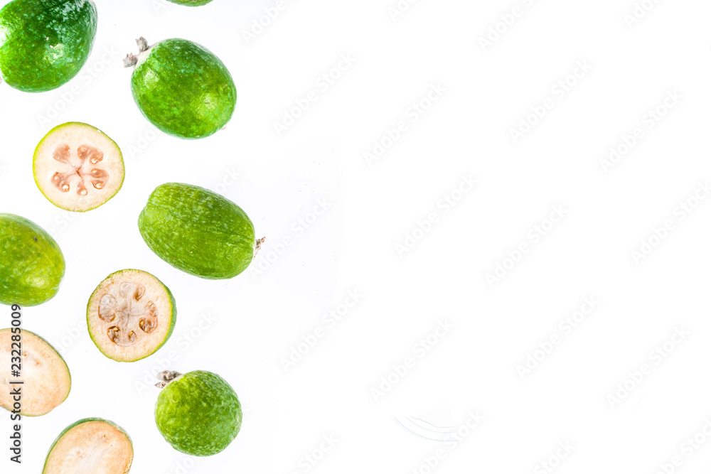 Tropical fruit, raw organic feijoa isolated on white background layout pattern copy space top view