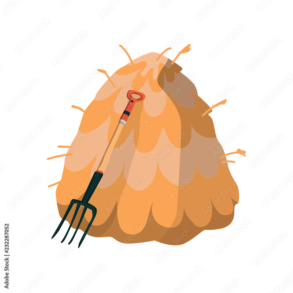 A haystack with a farm pitchfork A haystack with a farm pitchfork