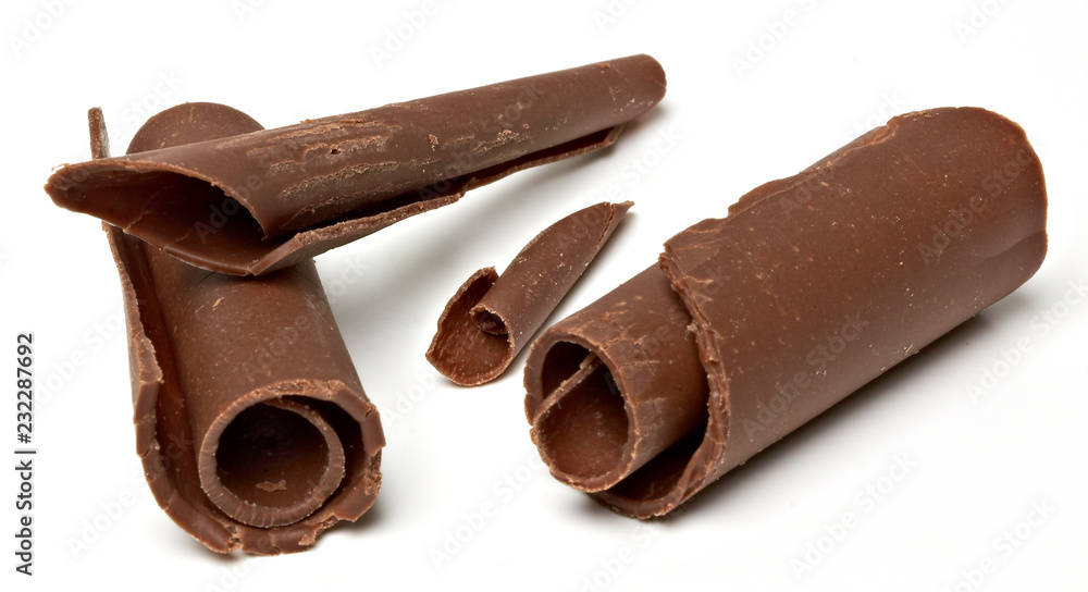 Dark chocolate curls isolated on white background Dark chocolate curls isolated on white background
