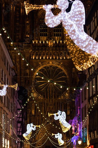 Christmas lights in front of Cathedrale Notre Dame in Strasbourg, Alsace, France photo