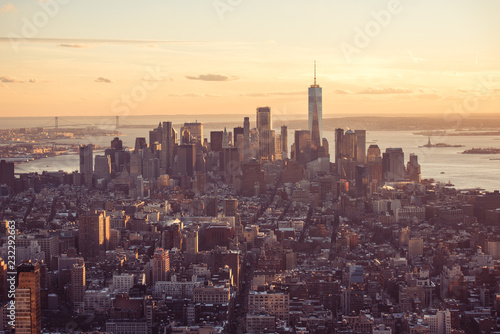 New York City - Manhattan downtown skyline skyscrapers at sunset and twilight. View from Empire State Building Platform. USA. © Simon Dannhauer