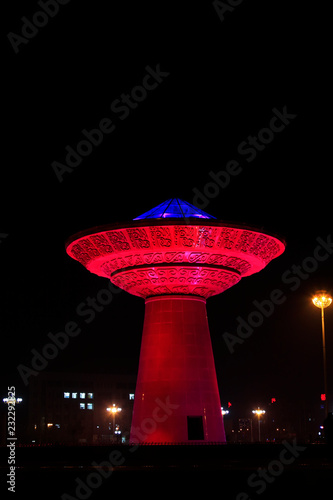 The great landmark building in a park at night on december 5, 2013, fucheng, hebei province, China. photo