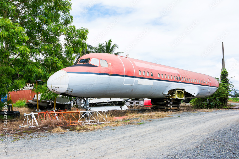 Fototapeta premium Closeup of abandoned airplane beside the road at Chiang Mai,Thailand
