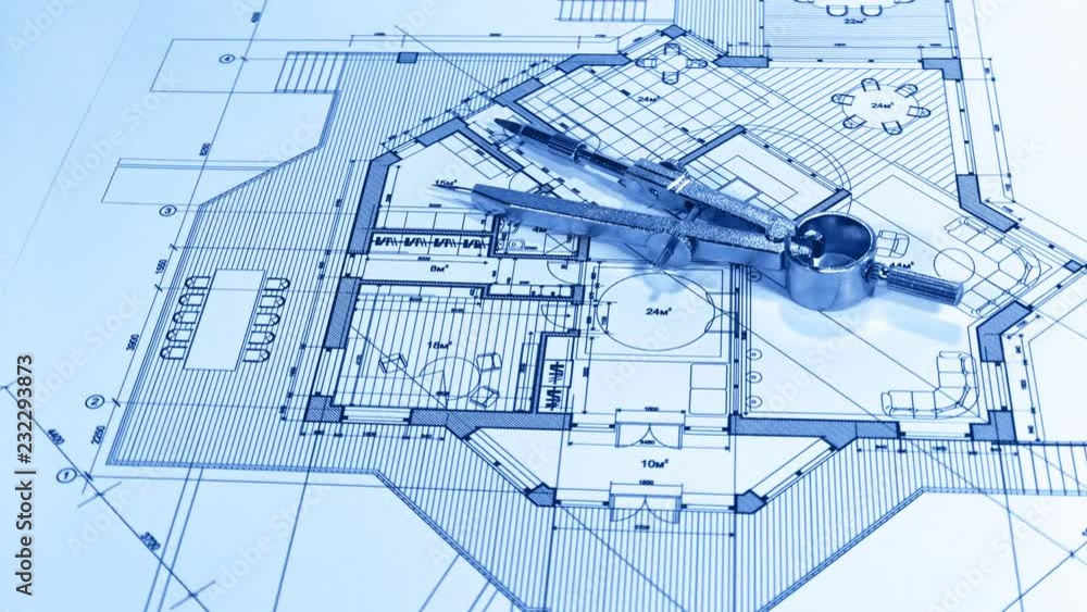 Blueprints - architectural drawings and compasses smoothly rotate on the surface of the architectural plan of a modern house Blueprints - architectural drawings and compasses smoothly rotate on the surface of the architectural plan of a modern house
