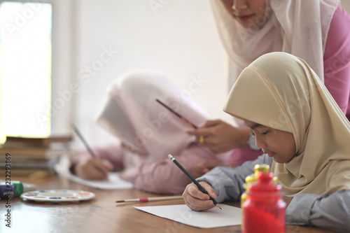Photography Asian muslim girls learning painting in class