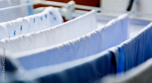 Konstfotografi Clothes left hanging to dry on a clotheshorse