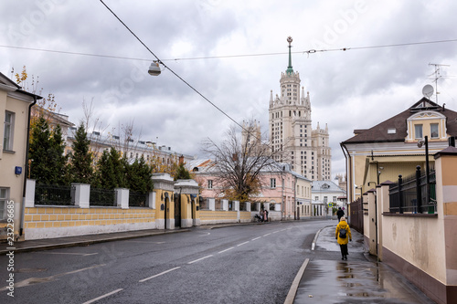 Moscow cityscape with old and modern architecture. View of Goncharnaya street and skyscraper on Kotelnicheskaya Embankment. photo